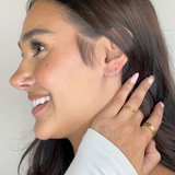 theia curly gold silver huggie