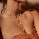 satya dot sunburst gold pendant necklace