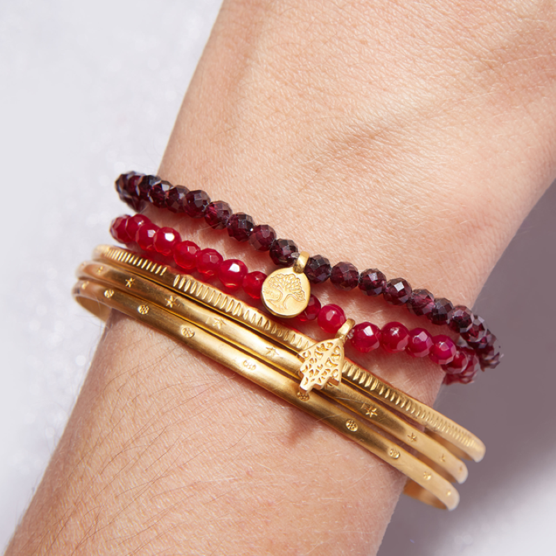 satya red garnet gold stretch bracelet