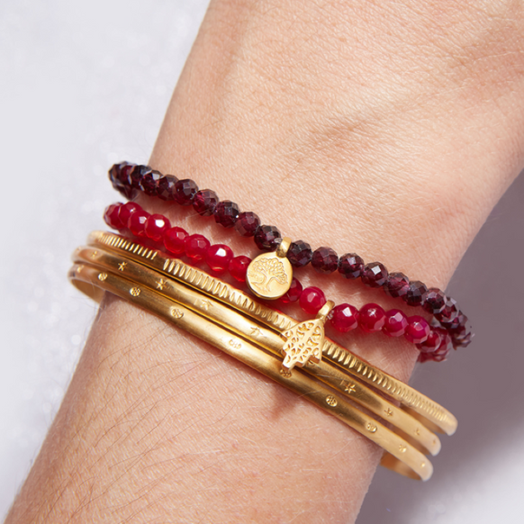 satya red garnet gold stretch bracelet