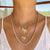 melinda maria baby jaguar gold emerald necklace