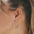 elizabeth stone silver fluid hoop earring